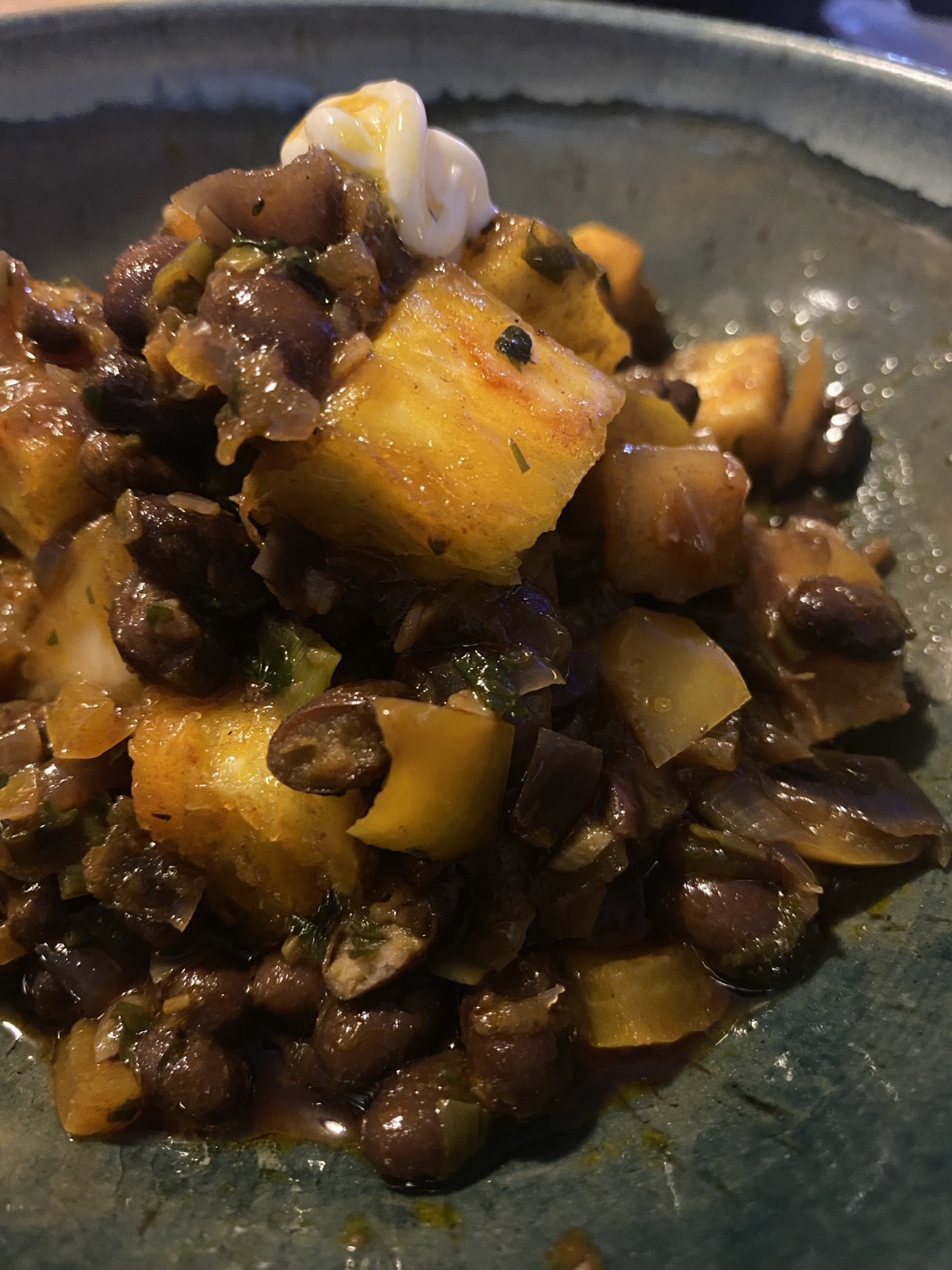 Close-up of Nyambi served on a dark plate